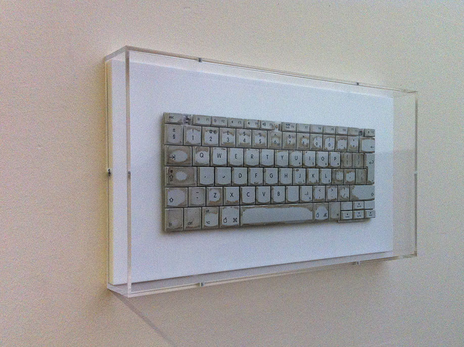 <b>Title: </b>Five Years of More New Blank Documents than Saves<br /><b>Year: </b>2010<br /><b>Medium: </b>iBook G4 keyboard on acrylic with perspex frame<br />