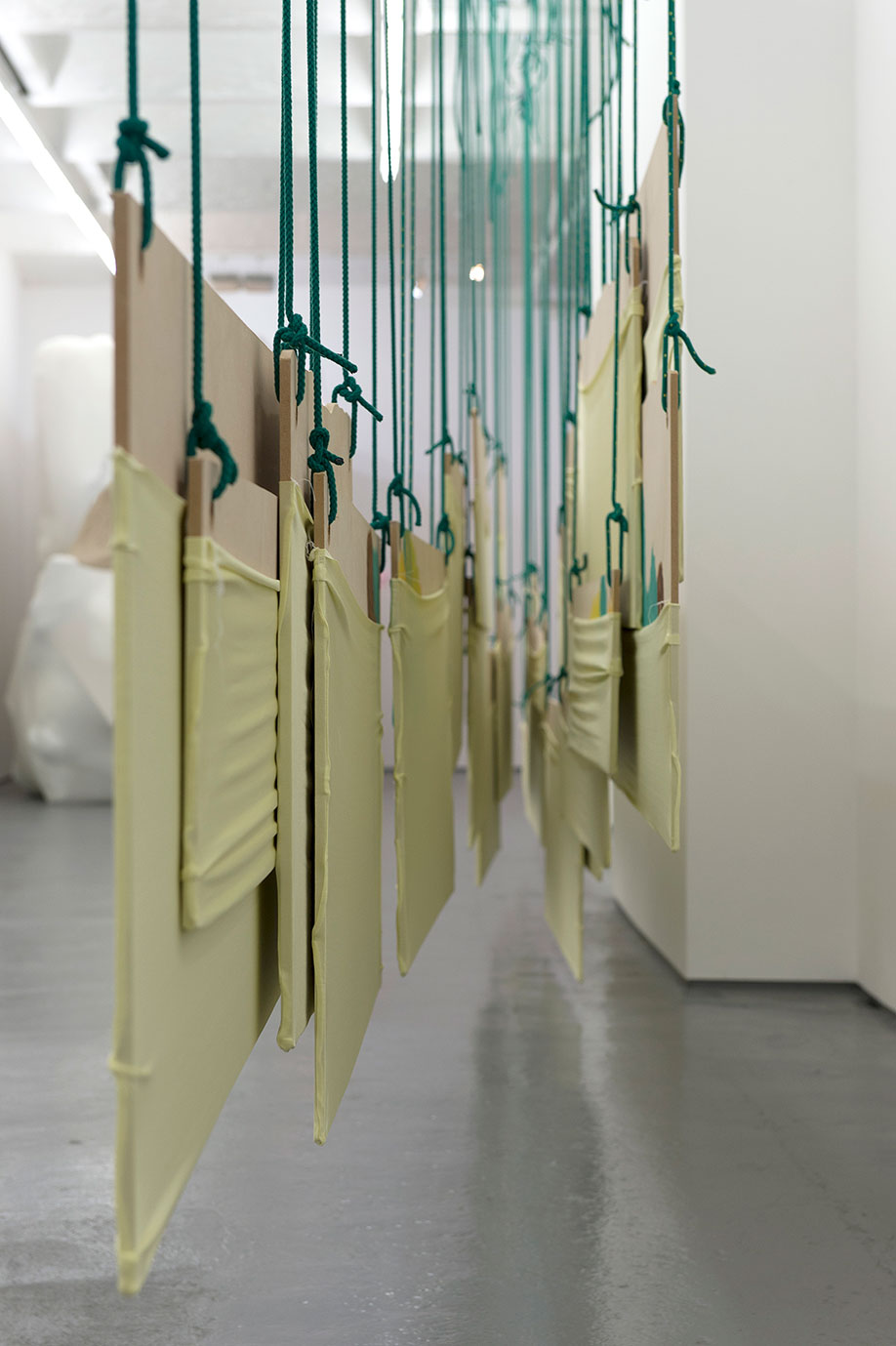 <b>Title: </b>Reconfiguring Landscape (Double Hanging Piece)<br /><b>Year: </b>2015<br /><b>Medium: </b>MDF, lycra, rope, and stainless steel<br /><b>Size: </b>Dimensions variable, 290 x 910 x 28 cm approx.