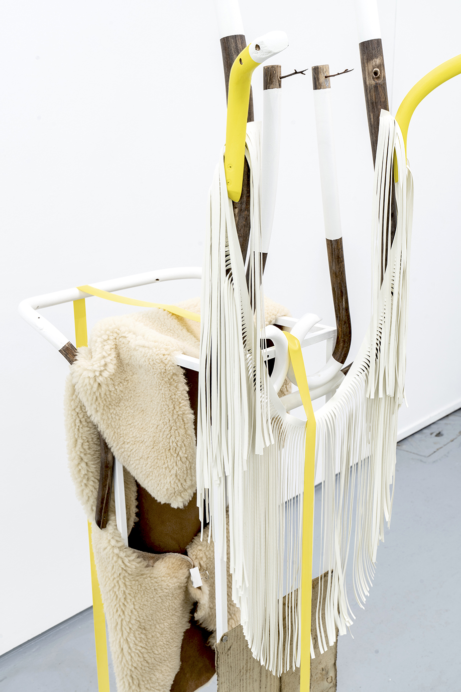 <b>Title: </b>PRECARIOUS CONDITIONS OF UNCERTAINTY V<br /><b>Year: </b>2021<br /><b>Medium: </b>De-constructed chair, Steel, accreted latex, PVC, sheep skin, rubber, clips, paint, thorns<br /><b>Size: </b>188 x 40 x 70 cm